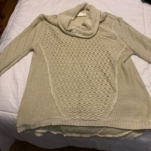 Gorgeous sweater with holes in front